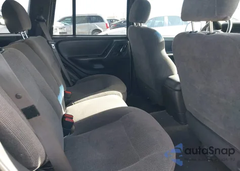 2000 Jeep Grand Cherokee Laredo из США, поврежденный, VIN 1J4GW48NXYC168947